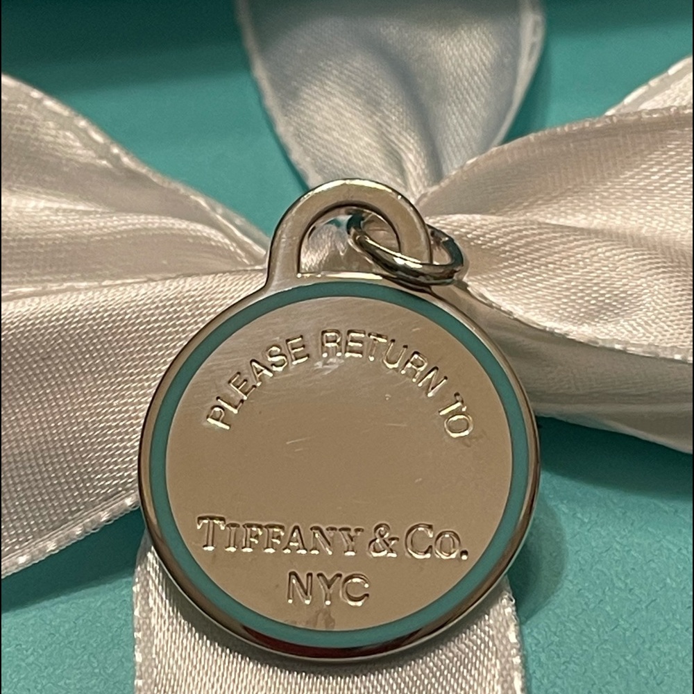 Tiffany & Co Blue outline circle tag large charm.